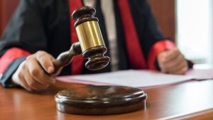 judge-and-gavel-in-courtroom-picture-id1168013916.jpg